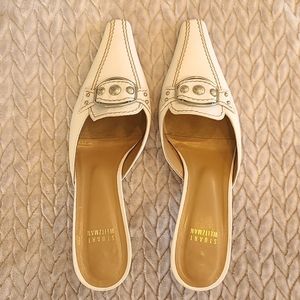 Stuart Weitzman white pointy toe mule pumps with stitch and stud detailing